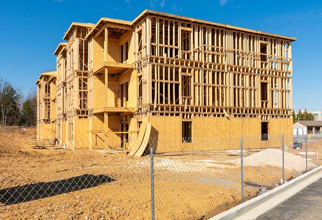 a panoramic view of temporary chain link fences on a construction site, separating work zones in Valley Village CA